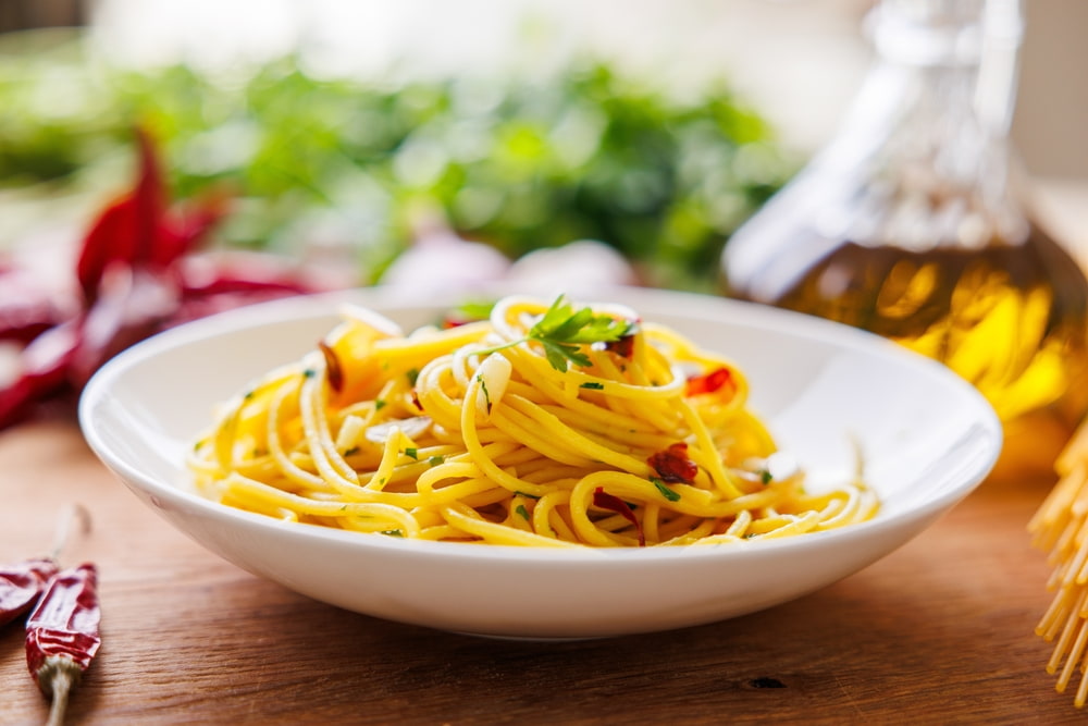 Spaghetti is one of the types of pasta noodles characterized by its long, round shape.